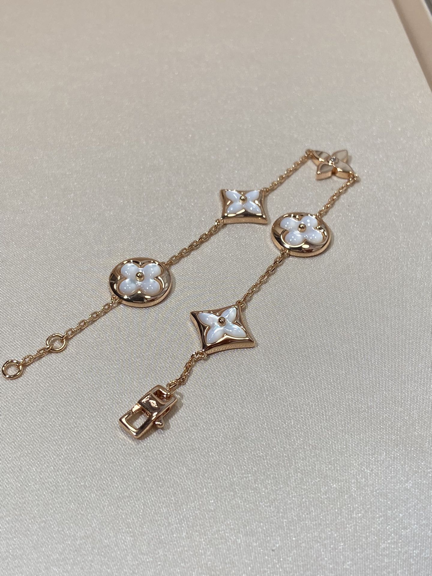 [Glow Muse]STAR AND SUN 5 MOTIF MOP PINK GOLD BRACELET